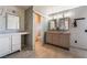 Updated bathroom featuring double vanities and updated countertops at 1407 Fields St, Las Vegas, NV 89142