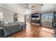 Bright bedroom with hardwood floors, ceiling fan, and access to balcony at 1407 Fields St, Las Vegas, NV 89142