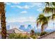 Expansive Las Vegas city views framed by palm trees from this beautiful home at 1407 Fields St, Las Vegas, NV 89142