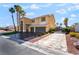 Long driveway leads to a well-maintained two-story home with three-car garage at 1407 Fields St, Las Vegas, NV 89142