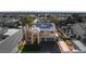Striking view of a two-story home featuring mature palm trees and solar panels at 1407 Fields St, Las Vegas, NV 89142