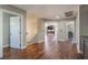 Hallway with hardwood floors leading to other rooms at 1407 Fields St, Las Vegas, NV 89142