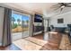 Bright main bedroom featuring a desk, a media center, and a patio at 1407 Fields St, Las Vegas, NV 89142