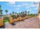 Large patio with an iron fence overlooking the neighborhood with palm trees at 1407 Fields St, Las Vegas, NV 89142