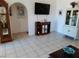 Inviting living room with tile floors and ample space for decor and furnishings at 1826 Dunes Ct, Laughlin, NV 89029