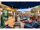 Relaxing backyard with pool, water feature, fire pit, and outdoor seating at 2 Yorkridge Ct, Henderson, NV 89052