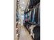 Walk-in closet featuring organized shelves, hanging rods, and shoe storage at 2 Yorkridge Ct, Henderson, NV 89052