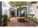 Charming courtyard with stone fountain feature and brick-paved ground at 2 Yorkridge Ct, Henderson, NV 89052