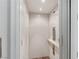 Interior view of elevator featuring wood floors, white walls, and stainless steel controls at 2 Yorkridge Ct, Henderson, NV 89052