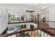 Spacious two-story foyer with iron railing, leading to the backyard with pool views at 2 Yorkridge Ct, Henderson, NV 89052