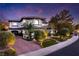 Beautiful front exterior with paved driveway and well-maintained landscaping at 2 Yorkridge Ct, Henderson, NV 89052
