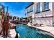 Luxurious backyard pool and spa with rock features and lounge chairs, creating a private resort-like escape at 2 Yorkridge Ct, Henderson, NV 89052