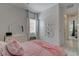 Comfortable bedroom showcasing a soft bed, a closet, natural light, and ample space at 21 Reverie Heights Ave, Henderson, NV 89011