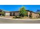 Modern home showcasing a three-car garage, manicured landscaping, and inviting curb appeal in a desirable neighborhood at 21 Reverie Heights Ave, Henderson, NV 89011