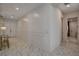 Bright hallway features marble floors, and decorative white wall trim design at 21 Reverie Heights Ave, Henderson, NV 89011
