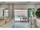 Inviting patio with an outdoor seating area and private pool, accessible from the elegant dining area at 21 Reverie Heights Ave, Henderson, NV 89011