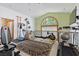 Bonus room featuring vaulted ceilings, arched window, and carpet, perfect for a home gym or rec room at 2112 Preakness Pass, Las Vegas, NV 89117