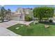 Charming two-story home featuring a landscaped front yard, garage, and inviting curb appeal at 2112 Preakness Pass, Las Vegas, NV 89117
