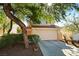 Charming two-story home showcasing a well-manicured lawn and attached two-car garage at 2333 Silver Crew Pass, Henderson, NV 89052