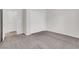 Cozy bedroom with carpet, featuring a closet with sliding doors and an entrance to a bathroom at 2343 Galilean Moon St, Henderson, NV 89044