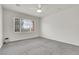 Neutral bedroom features natural light, carpet flooring, and neutral walls at 2343 Galilean Moon St, Henderson, NV 89044