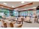 Community game room with ample seating and two pool tables at 2343 Galilean Moon St, Henderson, NV 89044