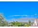Scenic view of palm trees and city skyline under a clear blue sky at 2496 Citrus Garden Cir, Henderson, NV 89052