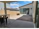 Back patio featuring concrete, gravel, a privacy wall, and seating at 2726 Marchetti Pl, Henderson, NV 89044