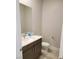 Powder room featuring a modern sink and vanity, toilet, and neutral wall color at 2726 Marchetti Pl, Henderson, NV 89044