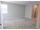Spacious bedroom with carpeted floor, and large window at 2726 Marchetti Pl, Henderson, NV 89044