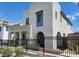 Stunning two-story home showcasing modern architectural design with clean lines and a neutral color palette at 2726 Marchetti Pl, Henderson, NV 89044