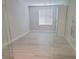 Room with sliding glass door, hardwood floors, window, and closet at 2726 Marchetti Pl, Henderson, NV 89044