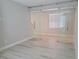 Room with sliding glass doors and light hardwood floors at 2726 Marchetti Pl, Henderson, NV 89044
