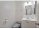Cozy bathroom with vanity, mirror, and toilet at 3164 Richford Pl, Las Vegas, NV 89102