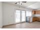 Eat-in kitchen with wood cabinets, granite countertops, and stainless steel appliances at 3164 Richford Pl, Las Vegas, NV 89102