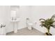 Modern half bathroom with a pedestal sink, toilet, and contemporary finishes at 334 Laurel Peak Dr, Henderson, NV 89015