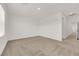Spacious bedroom with neutral carpet, airy design, and bright windows at 334 Laurel Peak Dr, Henderson, NV 89015
