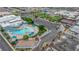 Aerial view of a community pool and recreation center with ample parking and convenient amenities at 334 Laurel Peak Dr, Henderson, NV 89015