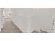 Hallway leading to bedrooms, enhanced by neutral wall color and carpet at 334 Laurel Peak Dr, Henderson, NV 89015