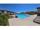 Resort-style community pool with lounge chairs, shade, and well-maintained landscaping for relaxing outdoors at 3434 Boleo Ct, Las Vegas, NV 89141