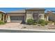 Attractive single-story home featuring a brick driveway and a two-car garage at 3434 Boleo Ct, Las Vegas, NV 89141