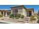Charming single-story home with landscaped front yard and inviting brick steps to the front door at 3434 Boleo Ct, Las Vegas, NV 89141