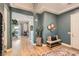Welcoming foyer features a chandelier, stylish decor, and a seamless transition to the living areas at 3434 Boleo Ct, Las Vegas, NV 89141