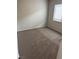 Bedroom with plush carpeting and natural lighting through the window at 3748 Autumn King Ave, Henderson, NV 89052