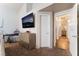 Bedroom featuring carpet, large dresser, and access to ensuite bathroom at 3839 Dusty Glen Ct, North Las Vegas, NV 89032