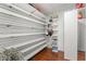 Custom closet features adjustable shelving, providing ample storage space for an organized wardrobe at 4406 Parkchester Cir, Las Vegas, NV 89108