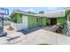 Single-story home with a covered patio, a unique water feature and off-street parking at 4406 Parkchester Cir, Las Vegas, NV 89108