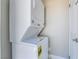 A convenient stacked washer and dryer in a utility closet with easy access at 4406 Parkchester Cir, Las Vegas, NV 89108