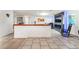 Open concept living area featuring tile flooring and a fireplace, great for entertaining at 4406 Parkchester Cir, Las Vegas, NV 89108