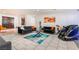 Spacious living room featuring tile flooring, contemporary furnishings, and stylish decor at 4406 Parkchester Cir, Las Vegas, NV 89108